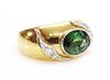 An 18ct two colour gold single stone tourmaline ring,