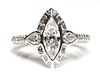 A platinum marquise diamond cluster ring,