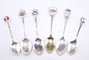 A COLLECTION OF SILVER AND ENAMEL COMMEMORATIVE TEASPOONS, George V and lat