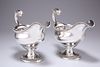 A PAIR OF GEORGE III SILVER SAUCEBOATS, by Thomas Evans, London 1775, each 
