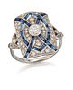 AN 18 CARAT WHITE GOLD ART DECO-STYLE SAPPHIRE AND DIAMOND RING, a round br