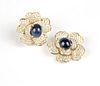 A pair of sapphire and diamond flower earclips