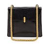 A Paloma Picasso Black Skin Handbag, 10" x 9" x 2.5".