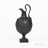 Wedgwood Black Basalt Ewer, England, early 19th century, bulbous shape with scrolled foliate molded handle terminating at a Bacchus mask, laurel and b