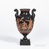 Encaustic Decorated Black Basalt Vase, England, c. 1780, leopard-head handles, iron red, black, and white figures, mounted atop a square plinth, ht. 1