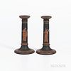 Pair of Wedgwood Encaustic Decorated Black Basalt Candlesticks, England, early 19th century, iron red, black, and white, each with a maiden and wide a