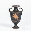 Wedgwood Encaustic Decorated Black Basalt Vase, England, 19th century, scrolled handles, iron red, black, and white decorated with a warrior on horseb