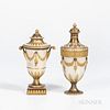 Two Wedgwood Gilded and Bronzed Queensware Vases and Covers, England, late 19th century, each with diapered ground, a bottle shape with fruiting festo