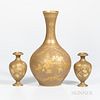 Three Wedgwood Gilded Drab Ground Earthenware Vases, England, c. 1885, each with floral decoration, a pair, ht. 5 1/2; and a bottle shape, ht. 12 1/4 