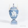 Wedgwood Solid Light Blue Jasper Vase and Cover, England, early 19th century, urn finial, applied white upturned loop handles and classical figures in
