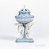 Wedgwood Light Blue Jasper Dip Michelangelo Vase and a Cover, England, early 19th century, pierced cover with a cherub finial centering radiating leav