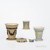 Five Wedgwood Yellow Jasper Dip Items, England, 19th and 20th century, a vase with black fruiting grapevine festoons and border, ht. 6; two with light