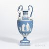 Wedgwood Solid Blue Snake-handled Vase, England, late 18th century, applied white classical figures in relief bordered with foliage, impressed mark, h