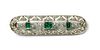 An early 20th century white gold emerald and diamond brooch,