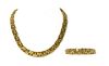 An 18ct gold necklace and bracelet suite, by Garrard,