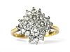 A gold diamond quatrefoil cluster ring,