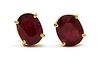 A pair of gold fracture filled ruby stud earrings,
