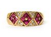 A gold ruby and diamond ring,