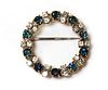 An 18ct gold sapphire and diamond wreath brooch,