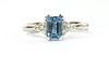 A white gold aquamarine and diamond three stone ring,