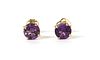 A pair of gold single stone amethyst stud earrings,