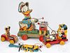 Four Fisher Price paper lithograph pull toys