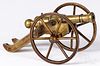 Brass toy cannon, including carriage