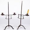 Two contemporary iron candlestands