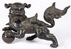 Chinese bronze foo lion with stone orb