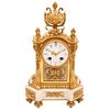 CHIMNEY CLOCK LOUIS XVI STYLE 20TH CENTURY Made of gold metal. Decorated with vegetable, floral and organic elements 14.5" (37 cm) tall | RELOJ DE CHI