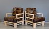 A Pair Of Hide Upholstered Arm Chairs In The
