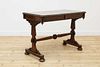 A late Regency or George IV pollard oak centre table,