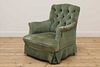 An armchair by Howard and Sons,