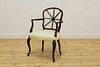 A French Hepplewhite-style mahogany open armchair,