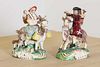 A pair of Staffordshire pottery figures,