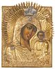 A Russian icon of the Virgin and Child with brass oklad