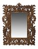 A carved giltwood wall mirror