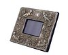 A sterling silver repousse picture frame
