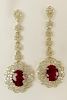 Pair AIG Certified 5.62 Carat Ruby, 3.13 Carat Diamond Gold Dangle Earrings.
