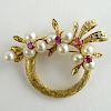 Lady's Vintage 14 Karat Yellow Gold, Round Cut Ruby and Pearl Pendant/Brooch.