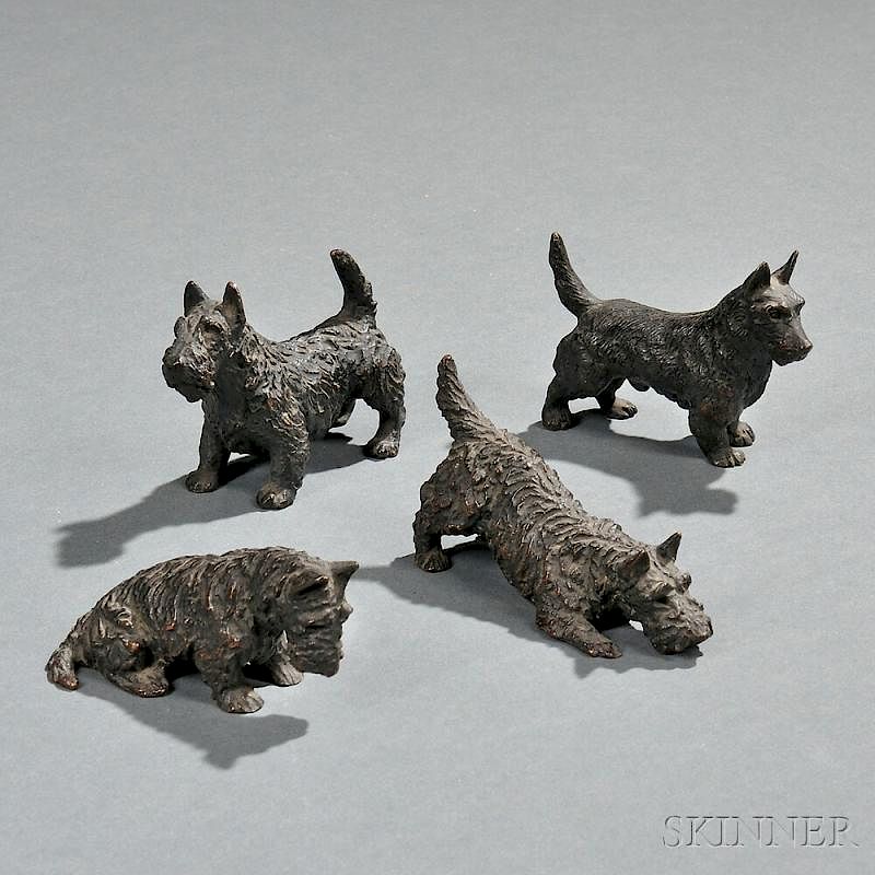 Marguerite Kirmse (American, 1885-1954) Three Bronze Scottie Dogs: One  Seated, One Crouching, One Standing sold at auction on 19th July