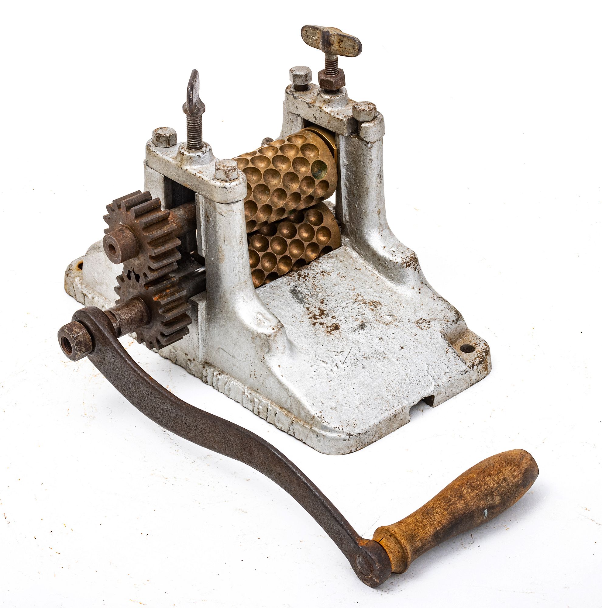 ANTIQUE CAST IRON & BRASS DROP CANDY PRESS, 19TH C, H 6.5, W 10, D 11.5  sold at auction on 24th February