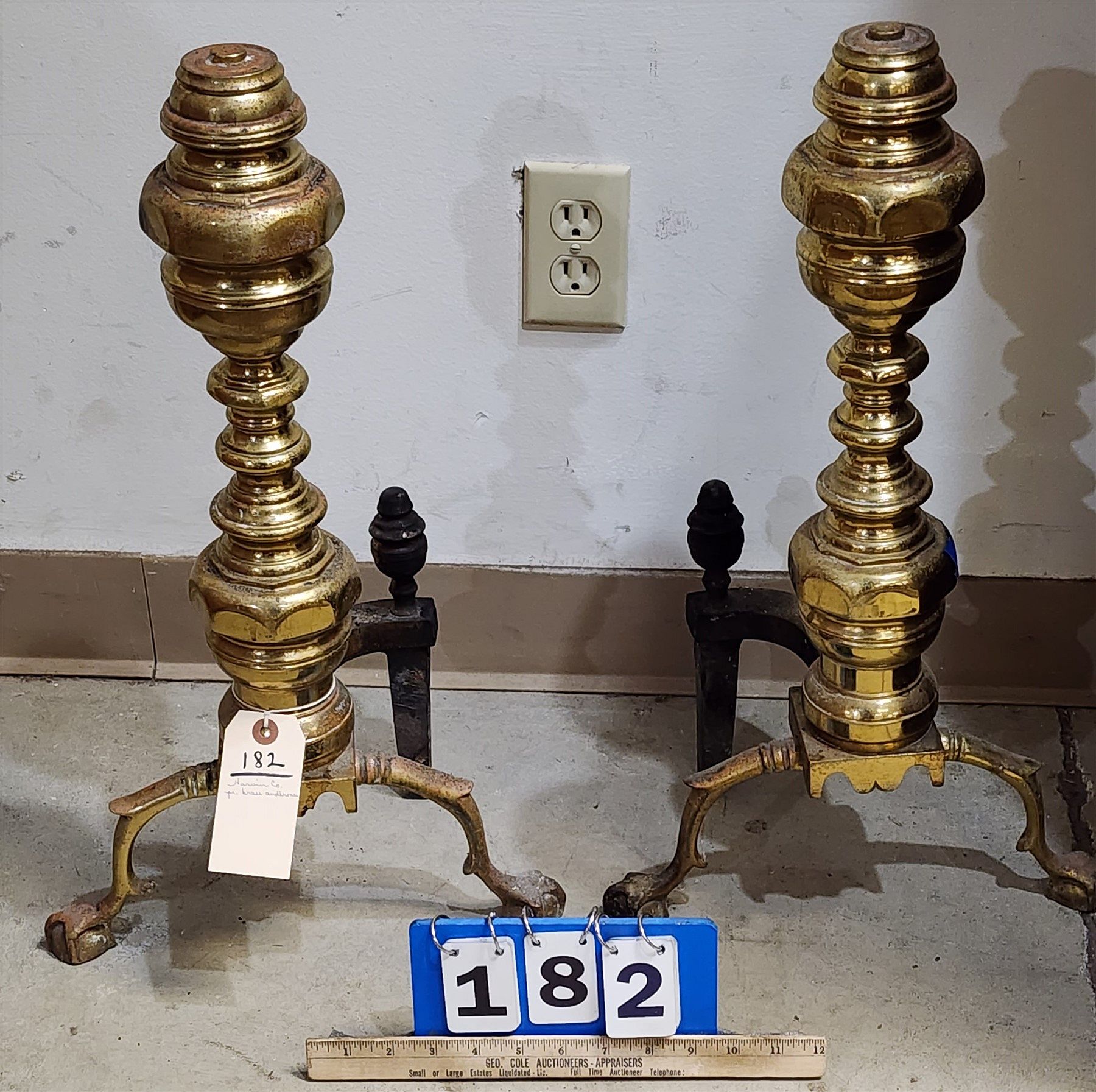 HARVIN CO PR BRASS ANDIRONS 23 for sale at auction on 30th