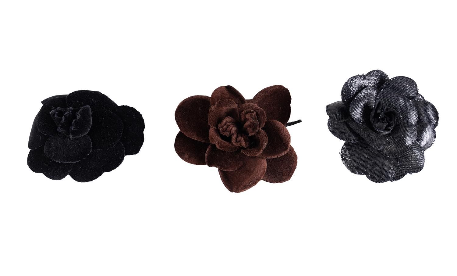 THREE CHANEL CAMELLIA FABRIC FLOWER BROOCHES for sale at auction