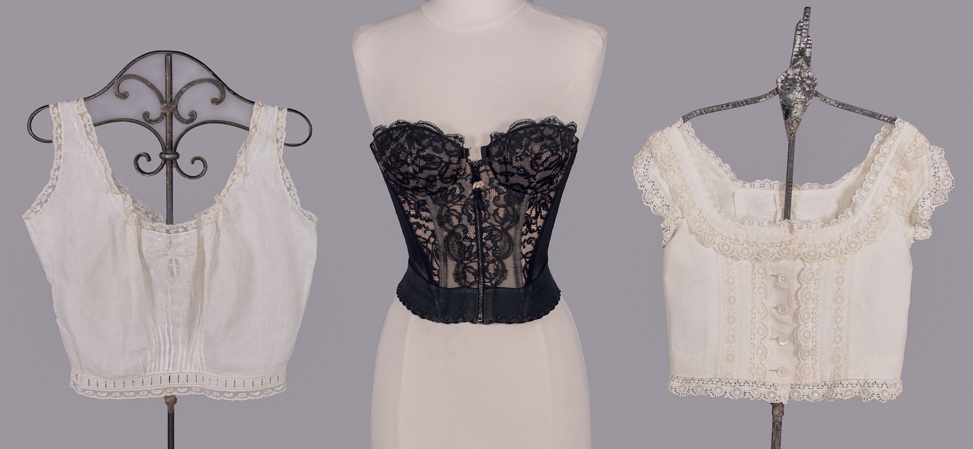 ONE CORSET & TWO CORSET COVERS, 1870-1900 & 1950s sold at auction on 6th  December