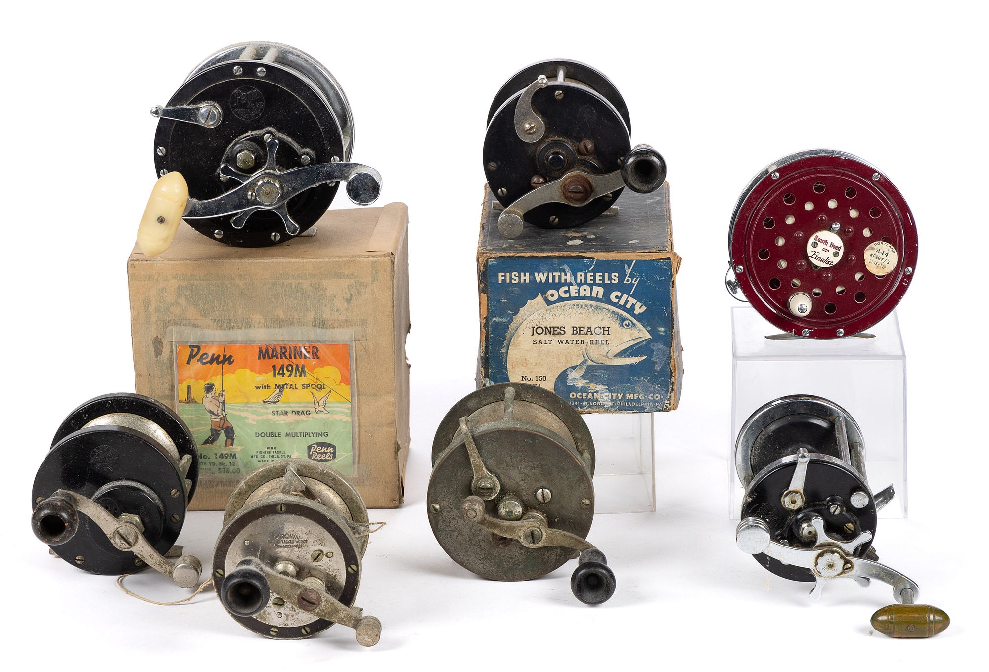 METAL AND CHROME FISHING REELS, LOT OF NINE sold at auction on 10th  February