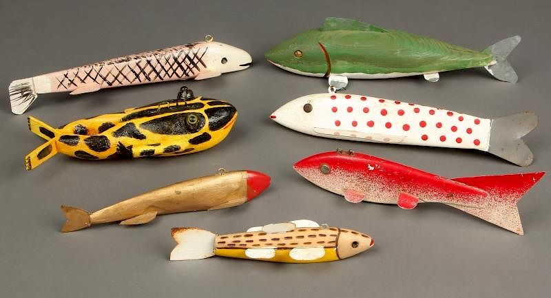 Collection of 7 Vintage American Fish Spearing Decoys sold at