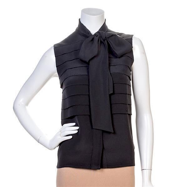 A Chanel Black Silk Sleeveless Blouse, Size 38. sold at auction on 25th  October