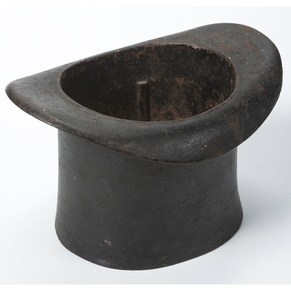 A Cast Iron Top Hat Spittoon sold at auction on 9th March | Bidsquare
