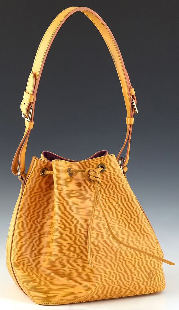 Louis Vuitton Noe PM Bucket Bag, in yellow epi leather with golden brass  hardware, the interior of the bag lined in purple suede, H.- 10 3/4 in.,  W.- sold at auction on